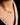 Close-up of a woman's neck showcasing CrossoverOvalGemstoneNecklace