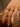 Close-up of a woman's finger showcasing Half Pavé Ring Set