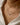 Close-up of a woman's neck showcasing Moissanite Heart Chain Necklace