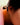 Close-up of a woman's ear showcasing MoissaniteHoopEarringswithMorganite