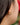 Close-up of a woman's ear showcasing MoissaniteHoopEarringswithMorganite