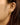 Close-up of a woman's neck showcasing MoissaniteOverlappedTriangleEarrings