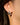 Close-up of a woman's ear showcasing MoissaniteTeardropSilverHoopEarrings