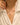 Close-up of a woman's neck showcasing Pear Cut Moissanite Drop Silver Necklace