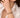 Close-up of a woman's neck showcasing PearlCuffTwoToneBangle