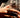 Close-up of a woman's finger showcasing Pearl Wide Band Ring