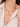 Close-up of a woman's neck showcasing PrayGirlEmeraldCoinNecklace