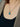 Close-up of a woman's neck showcasing Versailles Topaz Pendant Charm