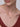 Model wearing a Linked Two-Tone Necklace with interlocking circle pendant in gold vermeil and silver tones.