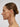 Profile view of a woman wearing Contour Hoops Earrings, showcasing their sleek and modern design.