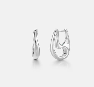 Contour Silver Hoops Earrings showcasing a minimalist sculptural design with smooth, organic curves.