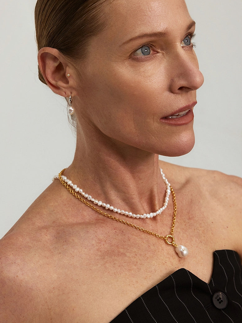 Close-up of a woman's neck showcasing Convertible Pearl Chain Necklace