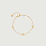 Diamond Bezel Dot Bracelet featuring a smooth gold chain and minimalist design with diamond accents.