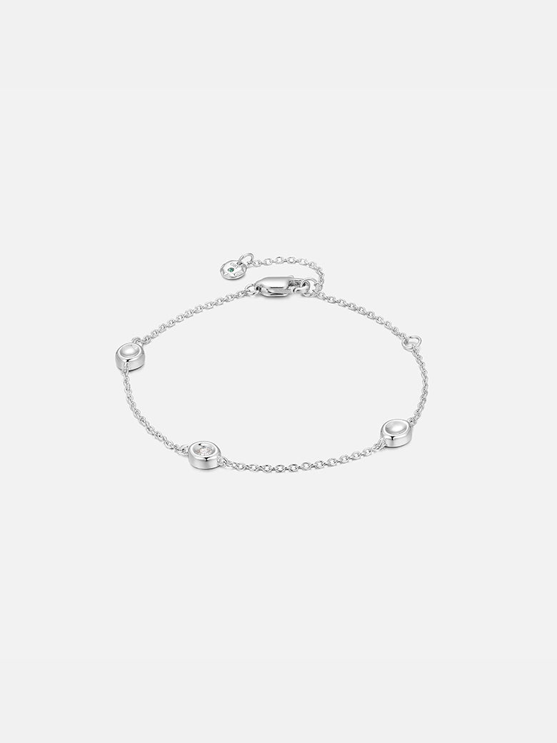 Diamond Bezel Dot Silver Bracelet featuring a minimalist design with diamond embellishments.
