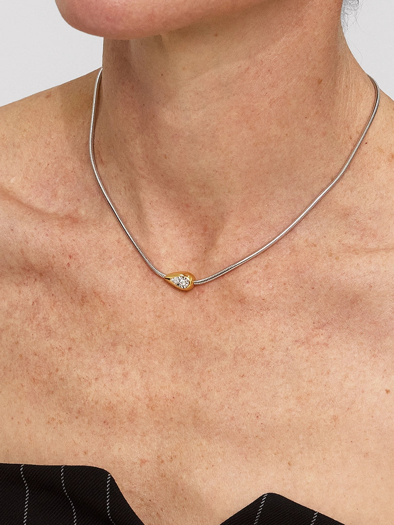 Close-up of a woman's neck showcasing Diamond Drop Glide Necklace