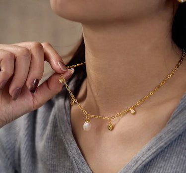 Close-up of a woman's neck Diamond Pearl Drop Necklace