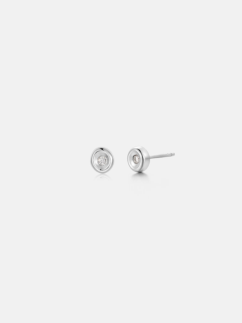 Diamond Wax Seal Silver Studs featuring a minimalistic design and a brilliant diamond, crafted from sterling silver.