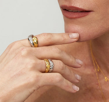 Model showcasing the Duo Dome Ring and other elegant rings on her fingers.
