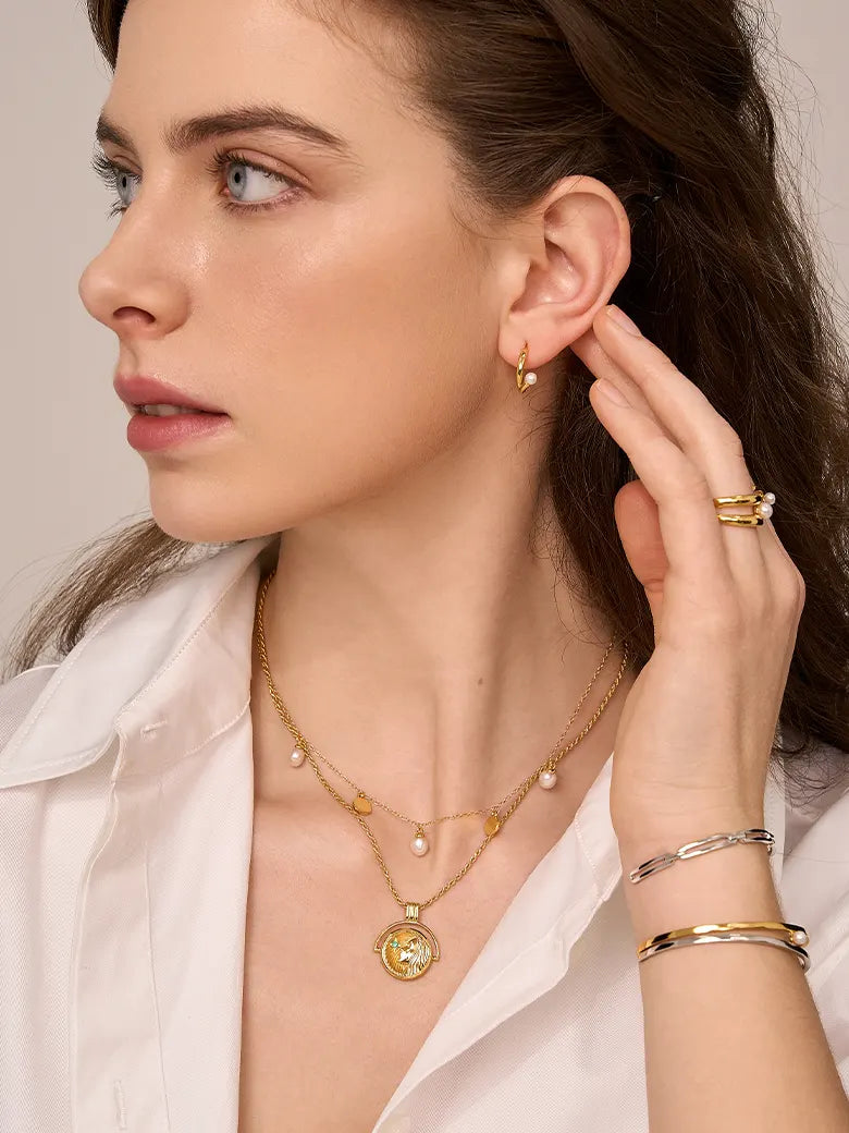 Close-up of a woman's neck showcasing FloatingPearlNecklace