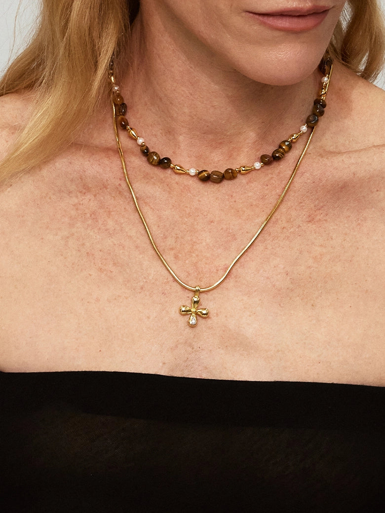Close-up of a woman's neck showcasing Golden Tiger's Eye Beaded Necklace