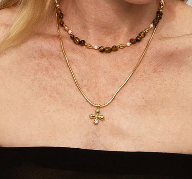 Close-up of a woman's neck showcasing Golden Tiger's Eye Beaded Necklace