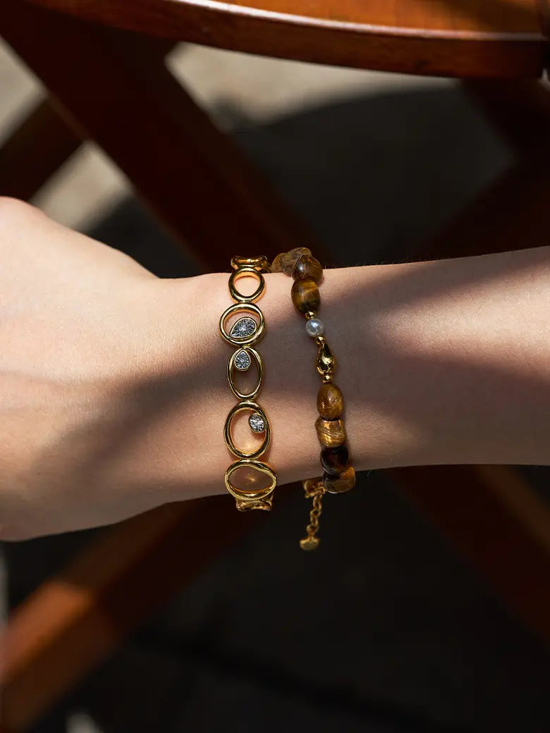 Close-up of a woman's wrist showcasing Golden Tiger's Eye Beaded Bracelet