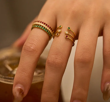 Close-up of a woman's finger showcasing Half Pavé Ring Set