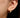 Close-up of a woman's ear showcasing MoissaniteHoopEarringswithMorganite
