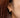 Close-up of a woman's neck showcasingMoissanite Teardrop Hoop Earrings