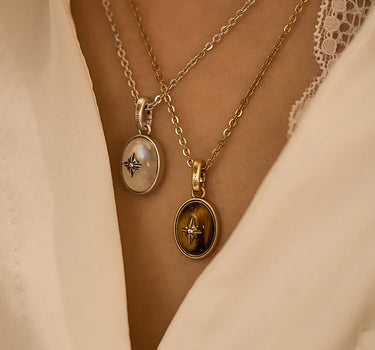 Close-up of a woman's neck showcasing Moonstone Signature Silver Charm