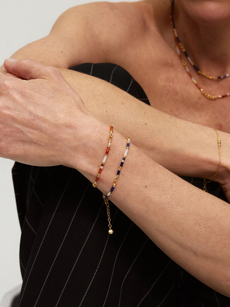 Close-up of a woman's wrist showcasing Ocean Rhythm Bead Bracelet