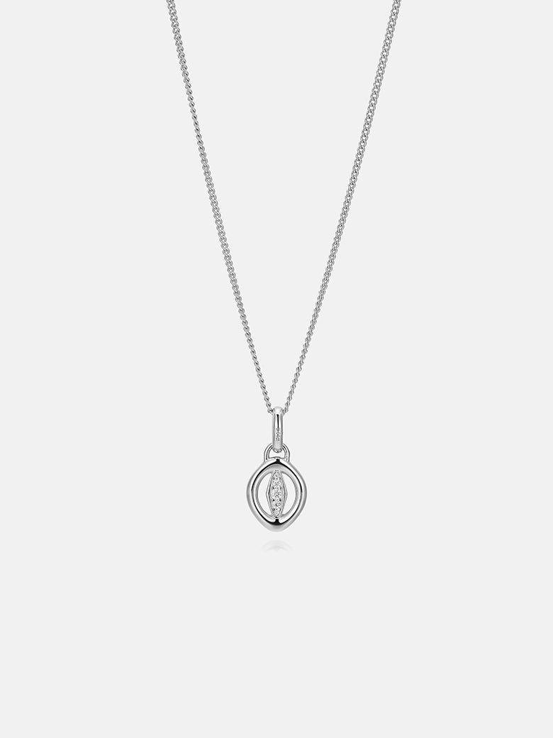 Oculus Diamond Silver Charm Necklace featuring a minimalist sculptural pendant in sterling silver.
