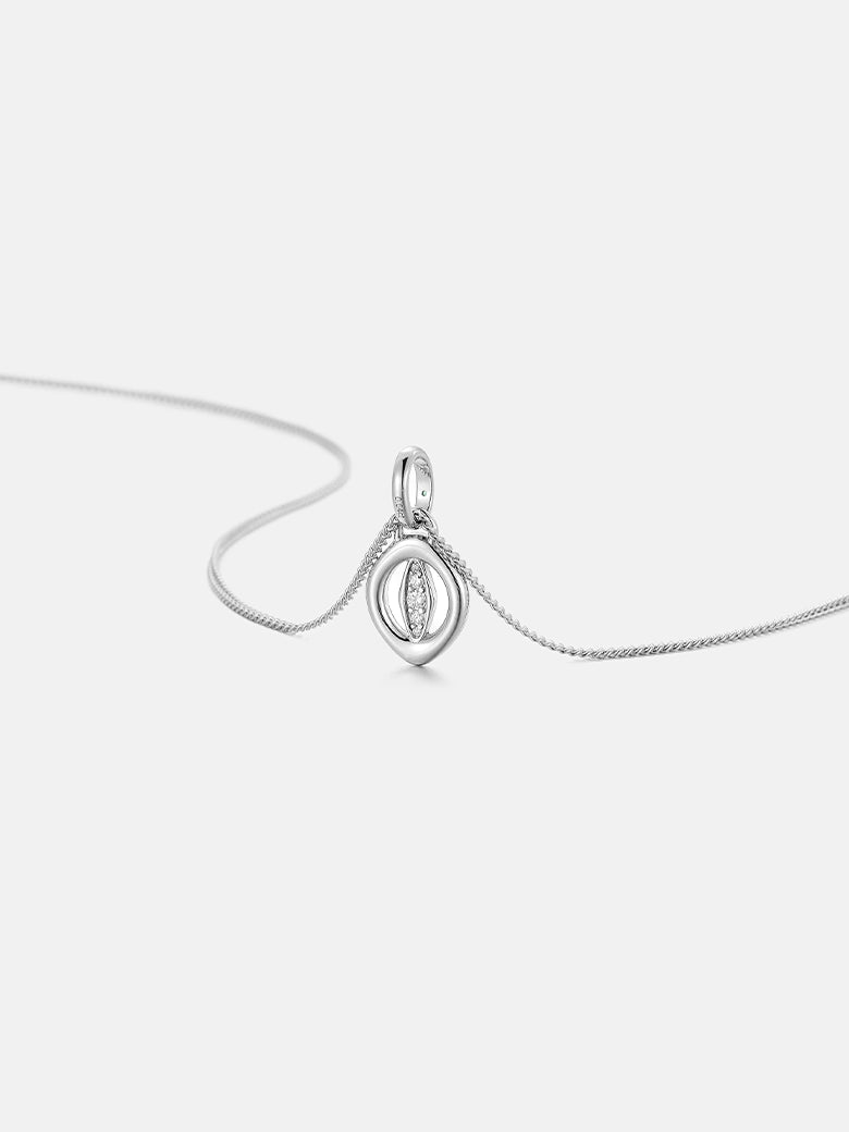 Oculus Diamond Silver Charm Necklace featuring a minimalist sculptural pendant on a delicate chain.