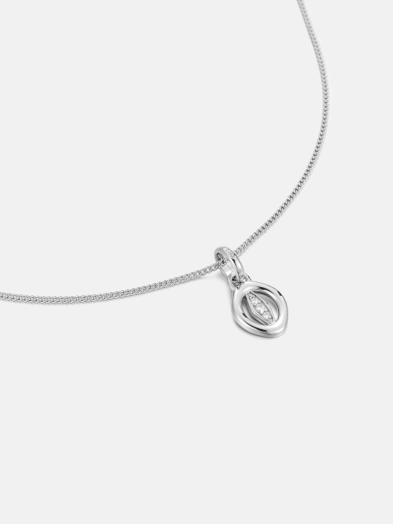 Oculus Diamond Silver Charm Necklace featuring a minimalist sculptural pendant in sterling silver.