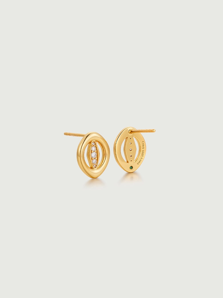 Oculus Diamond Studs featuring minimalist gold setting with circular design and sparkling diamonds.