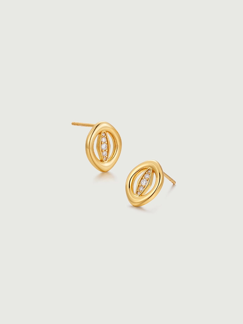 Stylish Oculus Diamond Studs in gold with a luminous circular setting and diamond embellishments.