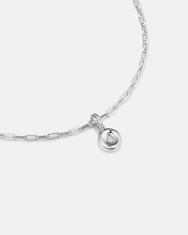Pear Dome Silver Pendant Necklace featuring a domed silver pendant with a moissanite stone on a paperclip chain.