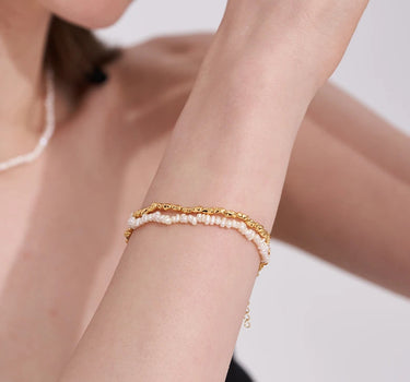 Close-up of a woman's wrist showcasing Daily Pearl Set