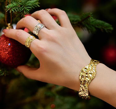 Close-up of a woman's finger showcasing Pearl Wide Band Ring