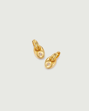 Pebble Solitaire Drops Earrings featuring an organic gold design with solitaire moissanite stones.