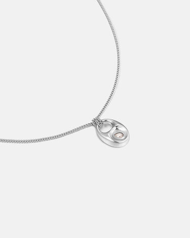 Pebble Teardrop Silver Charm Necklace featuring a smooth, organic teardrop pendant on a silver chain.