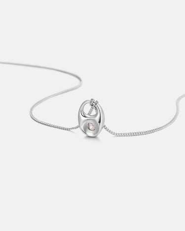 Pebble Teardrop Silver Charm Necklace featuring a smooth teardrop pendant on a delicate chain.