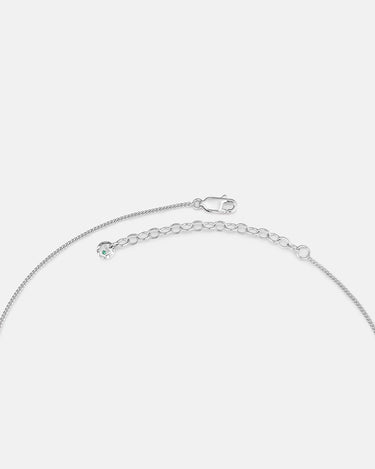 Pebble Teardrop Silver Charm Necklace featuring a delicate chain and clasp, showcasing its elegant design.