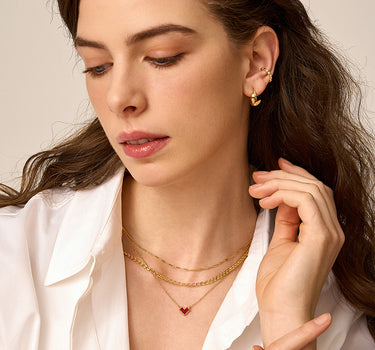 Close-up of a woman's neck showcasing PrincessCutRubyHeartNecklace