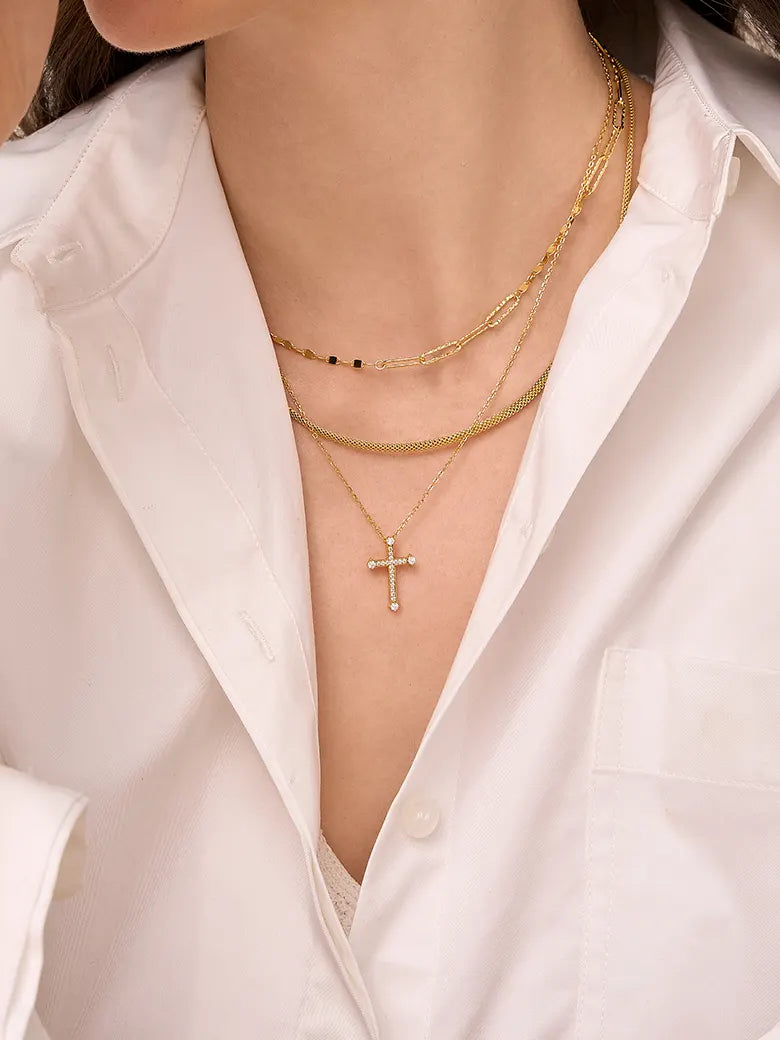 Close-up of a woman's neck showcasing
Radiant Faith Cross Necklace