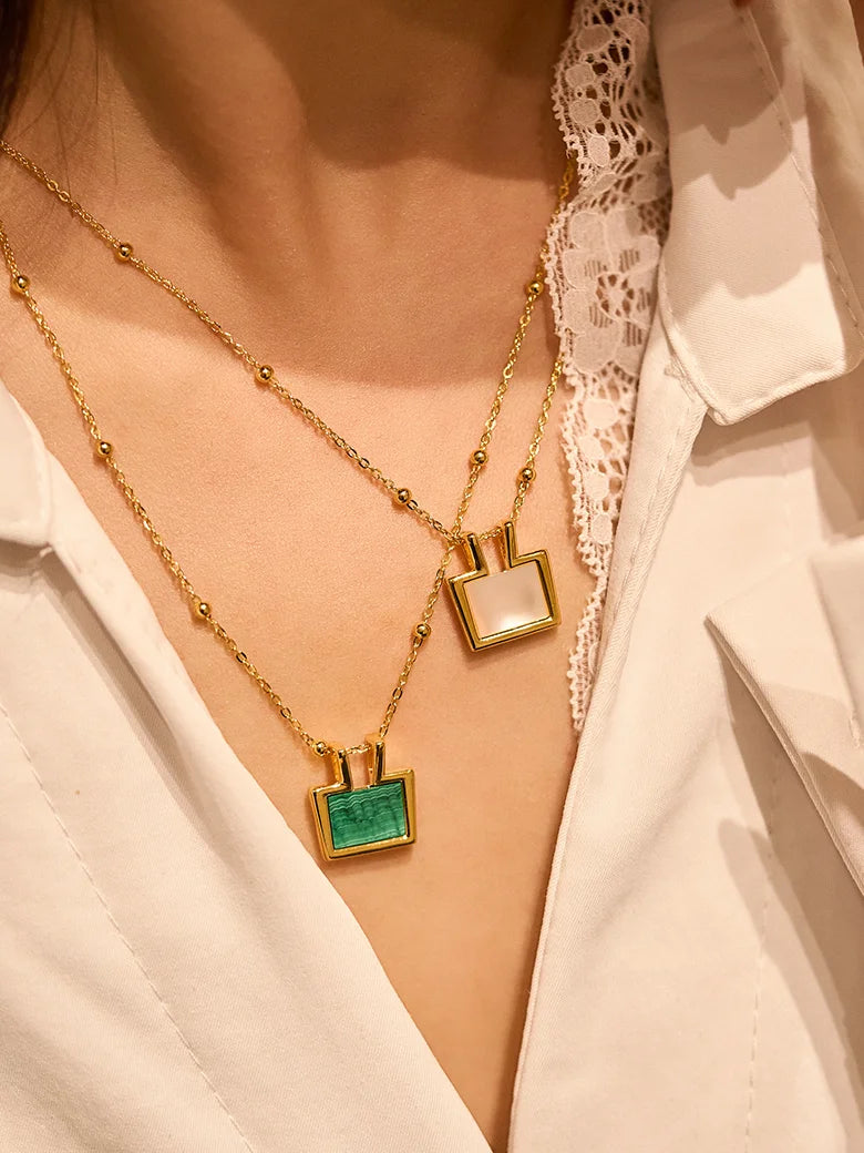 Close-up of a woman's neck showcasing Rectangle Malachite Charm Necklace