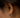 Close-up of a woman's ear showcasing SilverDoubleHoopEarrings
