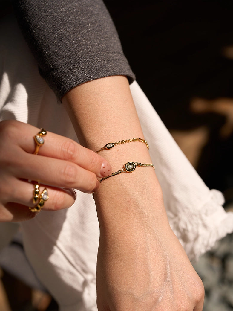 Solitaire Snake Chain Bracelet worn on wrist, showcasing its elegant design and brilliant solitaire accent.