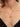 Close-up of a woman's neck showcasing StarfallChainNecklace