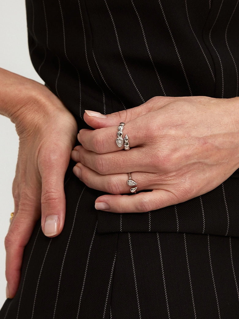 Close-up of a woman's ringshowcasing Twin Drop Ring